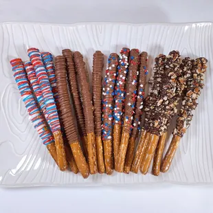 Chocolate-covered pretzels make delicious treats and great party favors or dessert table elements. Customizable by chocolate type and colors
