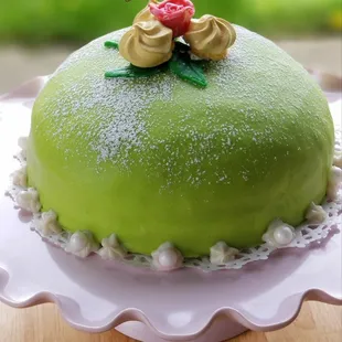 Traditionally known as a Princess Cake. Vanilla cake, whipped cream, and strawberries...oh my!