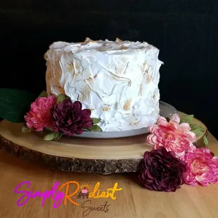 Pumpkin Spice Cake with Toasted Meringue and delicious cream cheese filling!