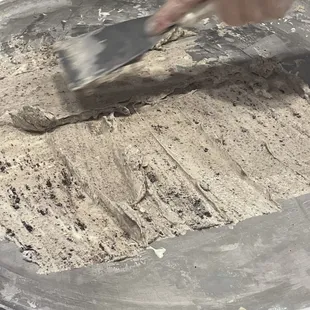 They out the mashed together ingredients on this frozen plate.