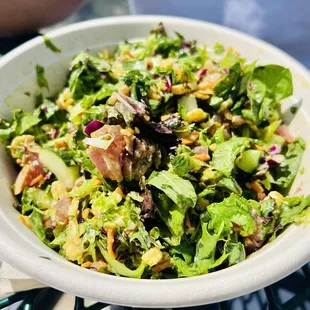 a salad in a white bowl