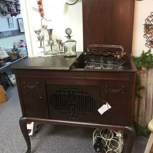 Beautiful antique phonograph cabinet. Would be a unique bar!