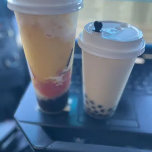 Large Coconut Mango Bliss and medium Jasmine Green Milk Tea with boba in both.