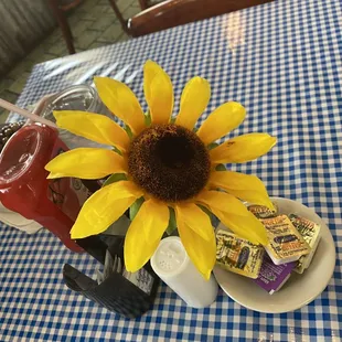 a sunflower on a table