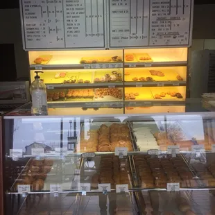 Menu and selection of typical donuts and Kolaches.