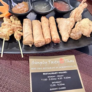 Excellent Thai Sampler #1. Spring Rolls, Crab Rangoon, Lumpia, Golden Money Bags, Satay and Mini Curry Puff.