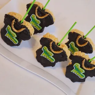 a plate of chocolate covered strawberries