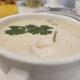 a bowl of soup on a plate