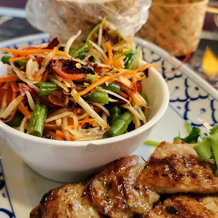 Papaya salad with pork skewers combo.. Level 5 Thai hot  . So spicy and so good! Donot get level 5 if you can&apos;t handle spicy!!!