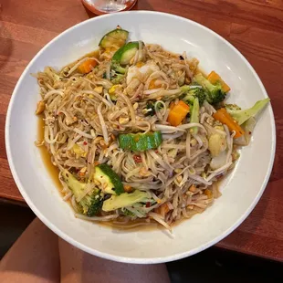 a plate of noodles and vegetables