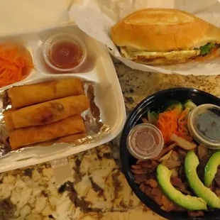 a tray of food and a sandwich