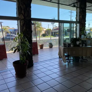 a restaurant with tables and chairs