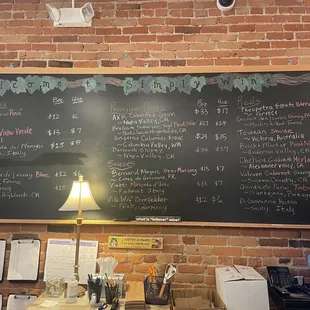 a man standing in front of a chalkboard