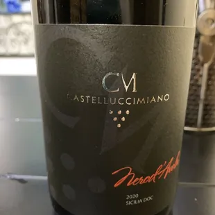 a close up of a bottle of wine