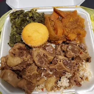 Oxtails with rice, greens, and yams. Soooooo good