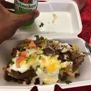 Loaded baked potato w-brisket and a adult beverage