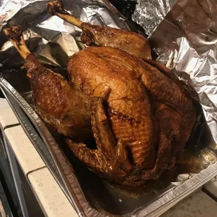 ows a roast chicken in foil