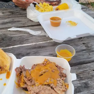 Brisket sandwich and ribs with corn and Mac and cheese