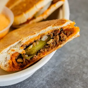 a sandwich and dipping sauce