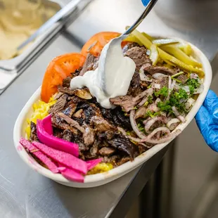 a bowl of food being served