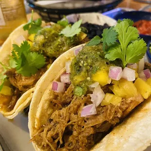 Carnitas tacos. You really could make 4 tacos with all this meat!