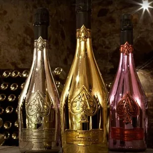 three bottles of sparkling wine