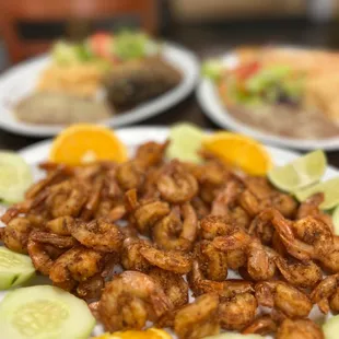 a plate of shrimp and vegetables