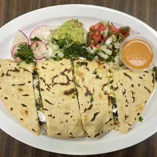 a plate of quesadillas