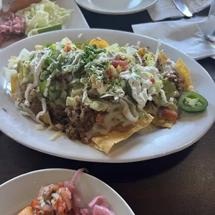 Nachos with ground beef, beautiful presentation, enough for two easily, yummy cheese!