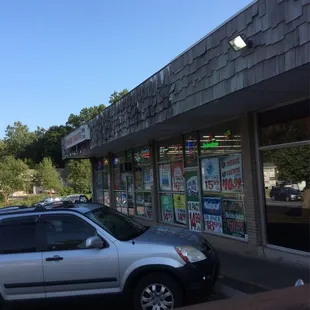 Patio faces liquor store / restaurant shares same building