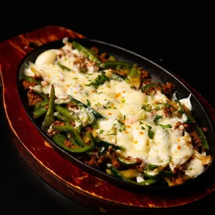 Queso Fundido w/ House made CHORIZO