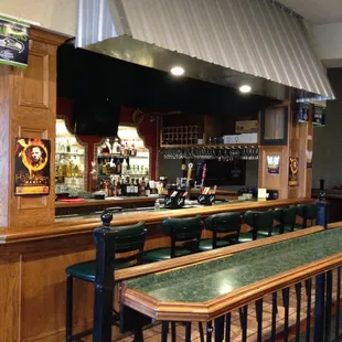 Large, full bar. There is a TV, pool table and small dancing area!