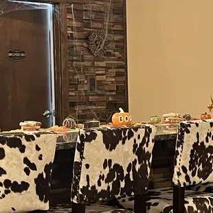 a dining room decorated for halloween