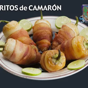 Our Toritos De Camaron Con Queso! Arguably our most popular appetizer, these bacon-wrapped peppers are stuffed with cream cheese and shrimp!