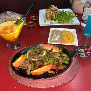Steak fajitas and new mango chamoy margarita