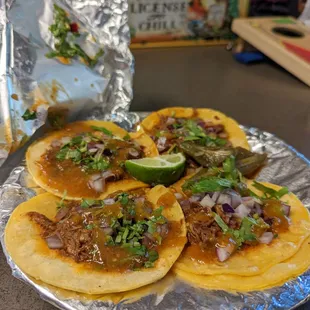 4 shredded beef tacos