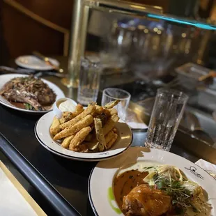 Braised rabbit, zucchini flies ( the bomb ) and ribeyes steak.