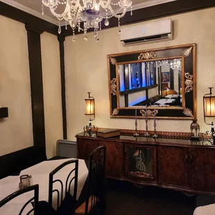 a dining room with chandelier