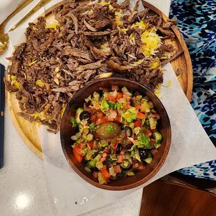 Saffron rice and beef shawarma with salad  .