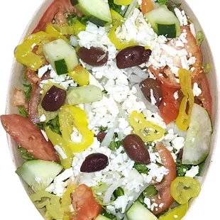 Greek Salad 
Lettuce, Tomatoes , Cucumber , Green pepper, Yellow Pepper, Onion, Kalamata Olives, Feta cheese , greek dressing