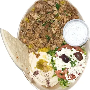 Chicken Gyros with Hummus and Salad Served with rice, hummus, salad , tzatziki, and pita bread.