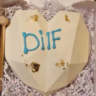 The &quot;Dilf&quot; smash cake that the wife got me for Father&apos;s day. It was filled with lots of yummy treats!