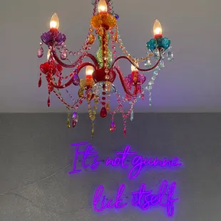 a chandelier with colorful lights