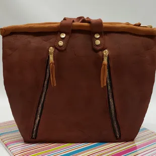 A Blythe Leonard Leather bag cake