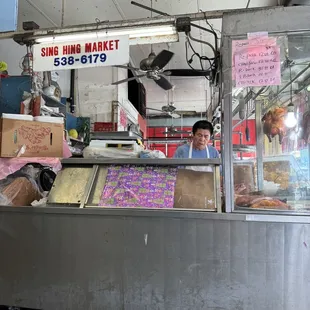 a woman behind the counter