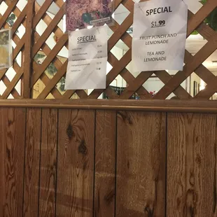 a wooden fence with a sign on it