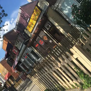 a row of buildings with signs on them