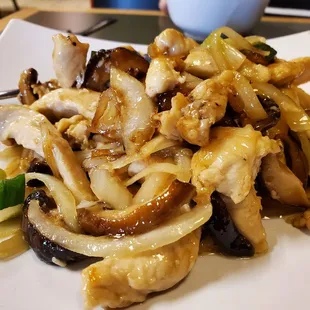a plate of stir fried food