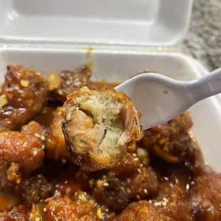 a close up of a piece of fried chicken