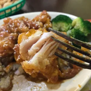 The chicken didn't seem cooked al the way. It was a kind of chewy. Sesame chicken